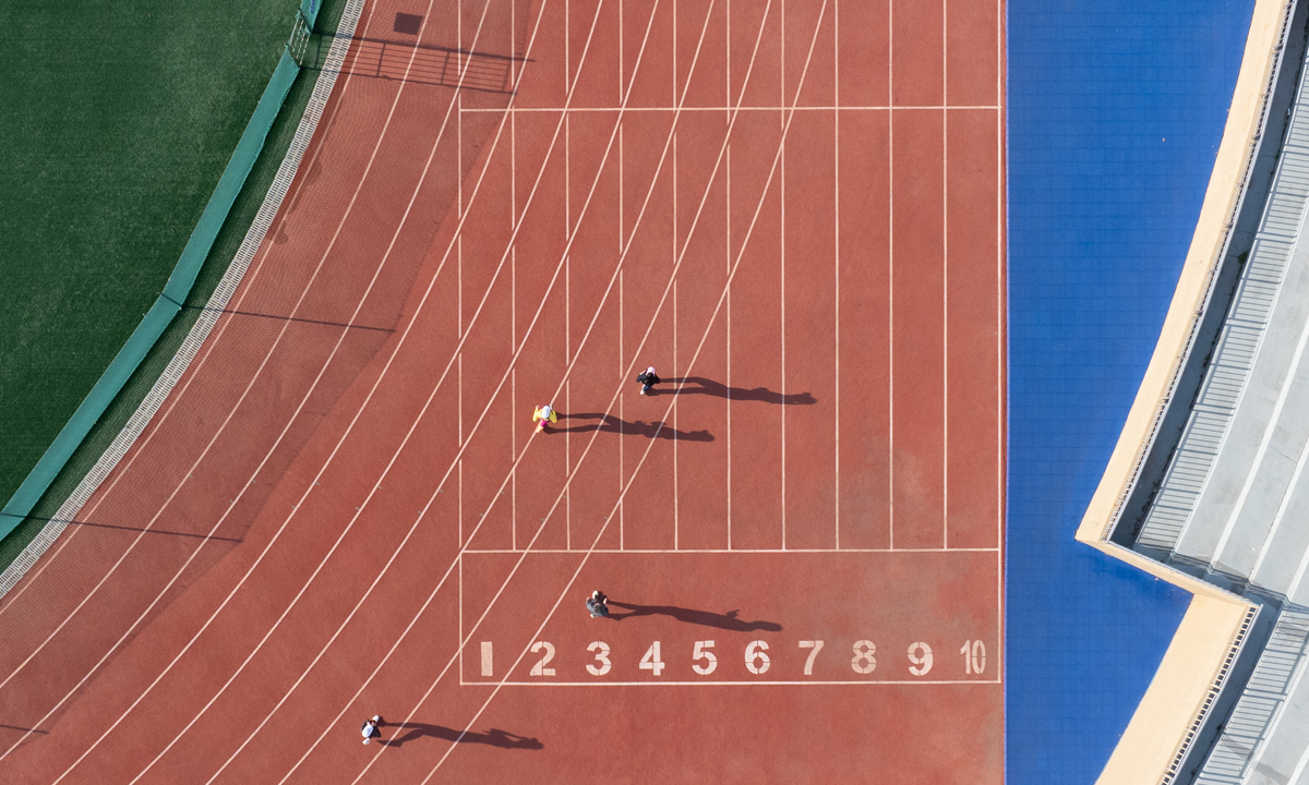 Sprinters on a track.