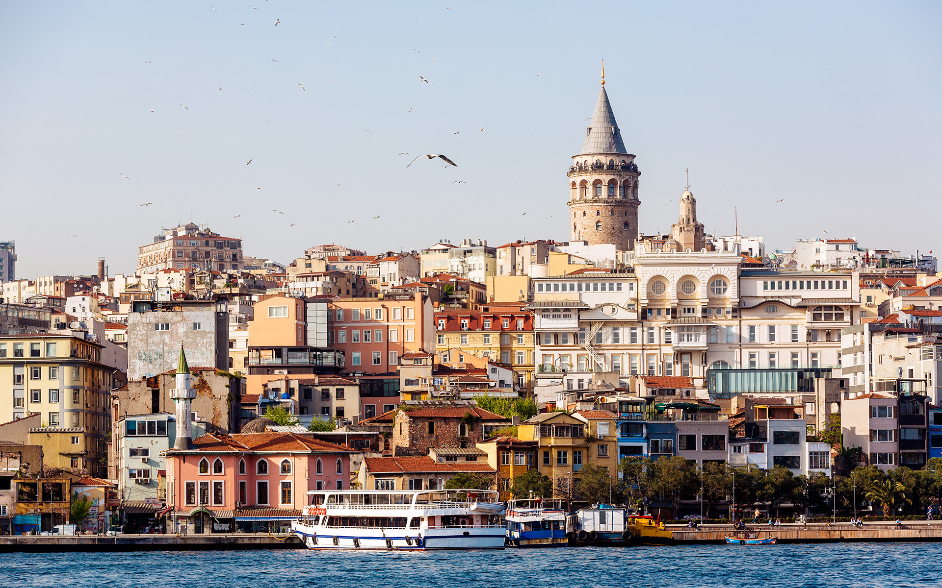 A view of the Istanbul waterfront as seen from a boat.
